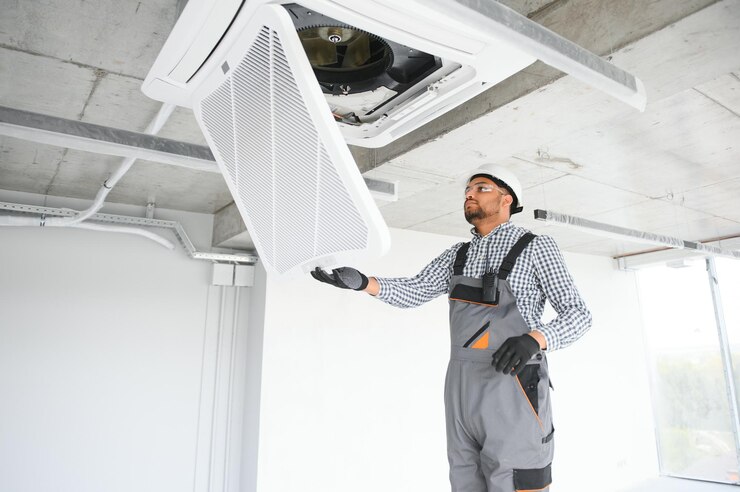 CleanFusion technician cleaning an air duct in an Orlando home